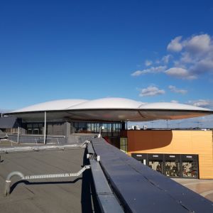 Cover tip protruding from the structure